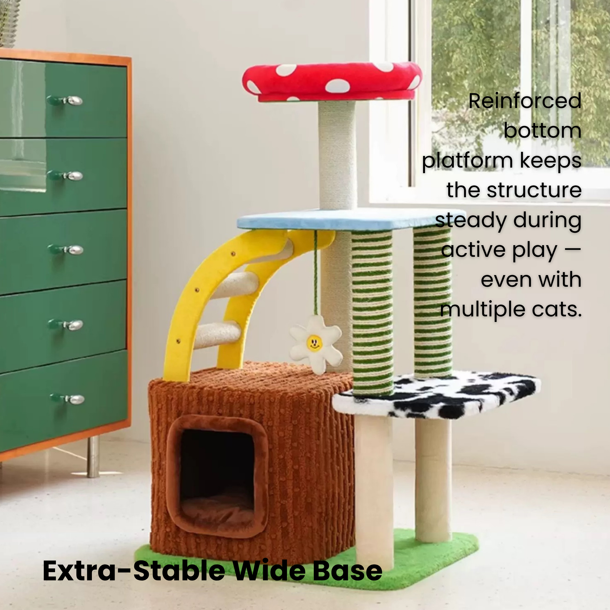 Cow print cat tree with mushroom perch, tree stump condo, and sisal scratchers.